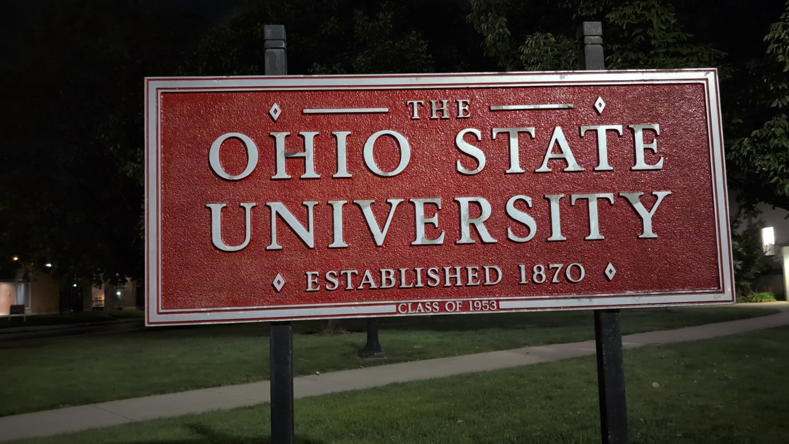 The Ohio State University sign photographed at night.